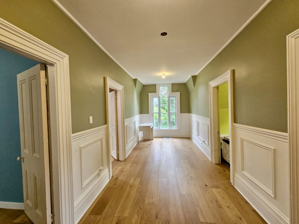 Interior painting of a bright living room in Moncton